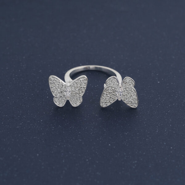 Two Butterfly Between the Finger ring